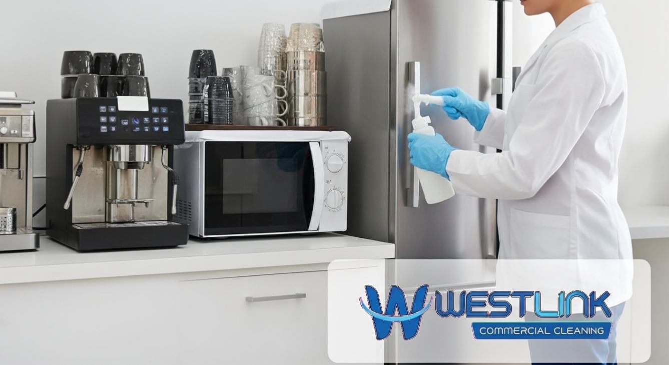 Cleaner disinfecting commercial office pantry appliances like coffee machines and fridge handles