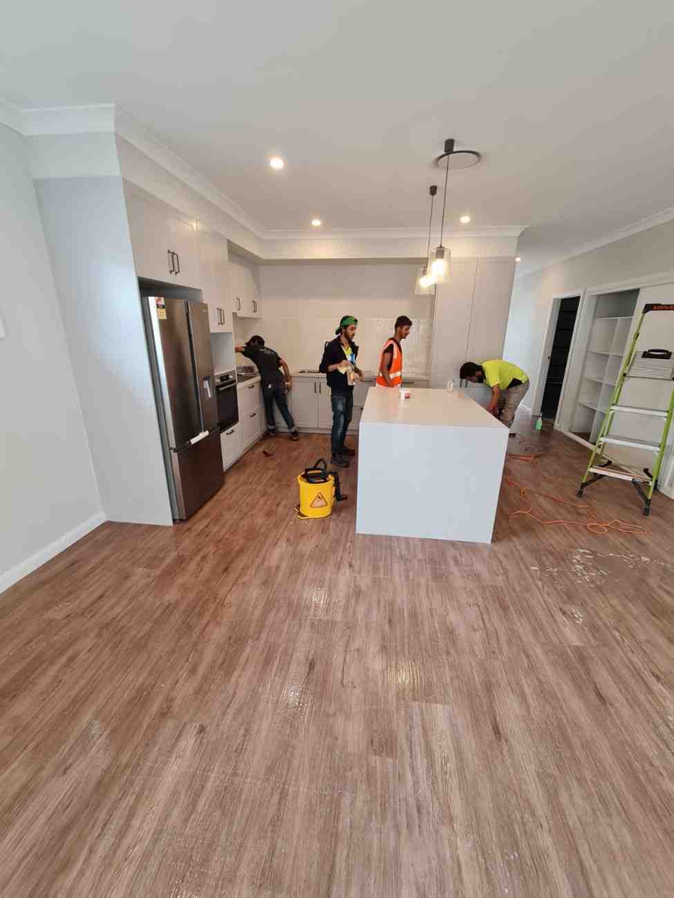 Professional cleaners performing deep commercial kitchen cleaning in Sydney