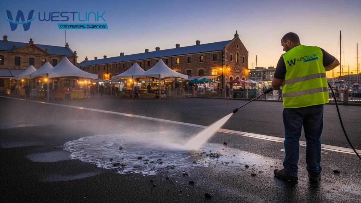 Wide view of pressure cleaning gum from asphalt in Fremantle, Perth, Australia,