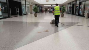 High pressure cleaning of shopping centre common areas in Sydney, keeping foot traffic zones clean, hygienic, and free from spills with minimal disruption.