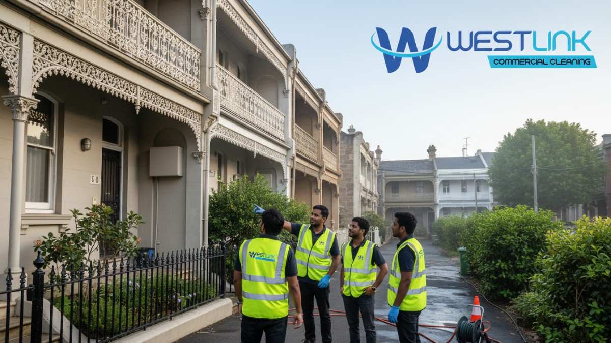 Scene of commercial pressure cleaning on historic terraces in Paddington, removing buildup to reveal restored beauty by Westlink Commercial Cleaners.