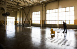 Professional cleaning and maintenance services for warehouse and factory concrete floors
