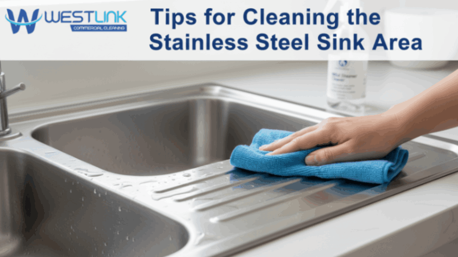 Cleaning a stainless-steel kitchen sink.