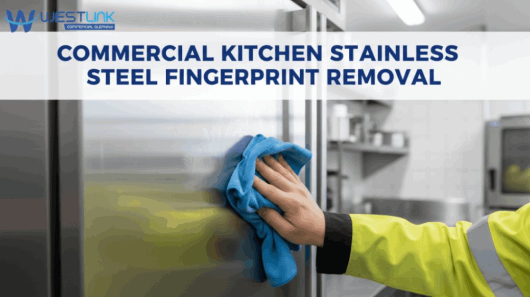 Cleaning fingerprints from a stainless steel surface in a commercial kitchen.