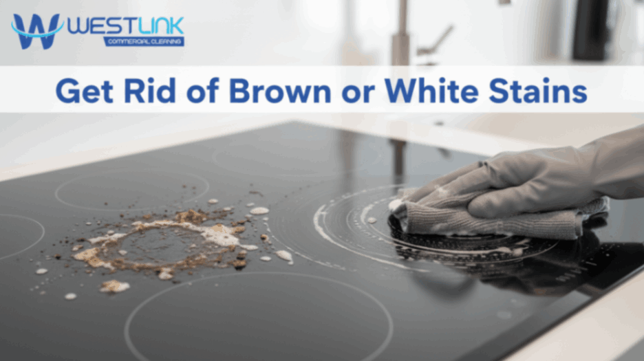 Cleaning brown or white stains from a kitchen glass surface.