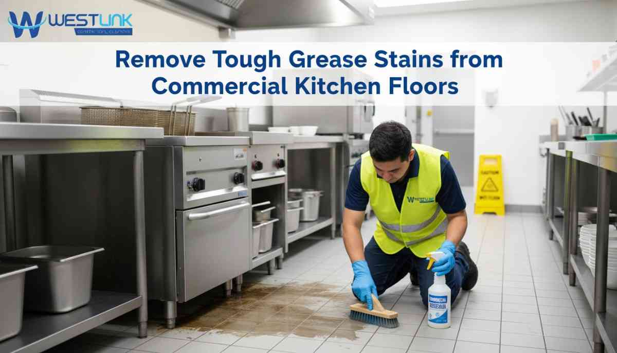 Commercial kitchen worker scrubs greasy tile floor grout near a fryer with visible stain reduction.